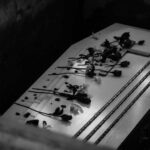 ‘Nice’ Mafia Boss DEAD — But Was He Really Nice? Coffin with flowers inside a dark burial plot