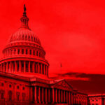 United States Capitol building under red-tinted sky