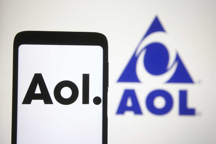Smartphone displaying the AOL logo with a blue AOL emblem in the background