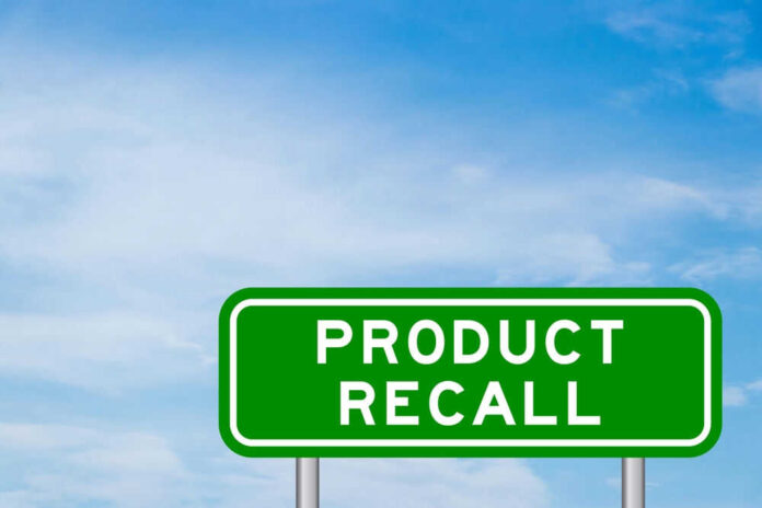 shutterstock_2182367505.jpg Green sign with product recall text and sky background