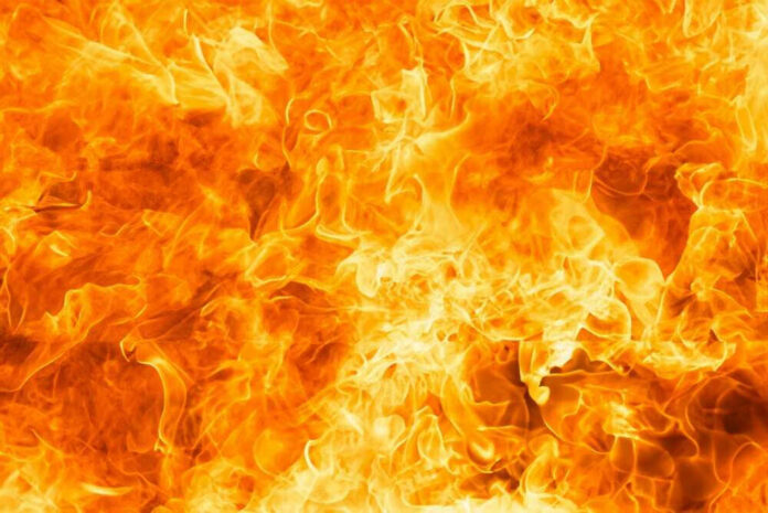 Bright orange and yellow flames burning intensely.