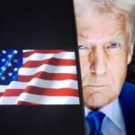 Close-up of Donald Trump with an American flag in the background