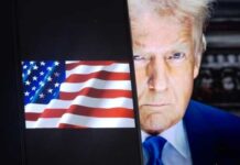 Close-up of Donald Trump with an American flag in the background