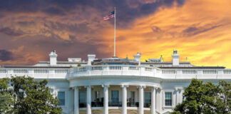 The White House with vibrant sunset sky