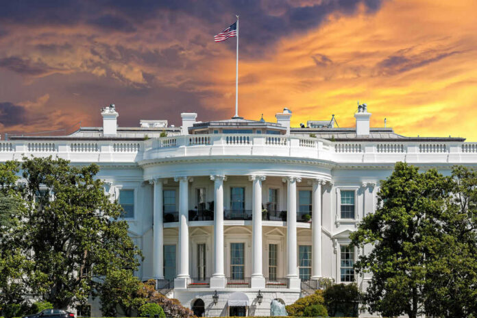 shutterstock_382759309.jpg The White House with vibrant sunset sky