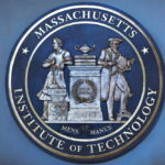 MIT Snubs Trump Bronze seal of the Massachusetts Institute of Technology featuring two figures and the year 1861