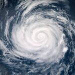 Hurricane Hunter Captures Record Breaking Event Aerial view of a swirling hurricane over the ocean
