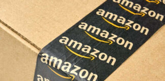 Close-up of an Amazon-branded shipping box tape on a cardboard box