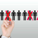 120,000 Jobs VANISH — Small Business Massacre Hand crossing out stick figures with a red marker.