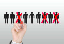 120,000 Jobs VANISH — Small Business Massacre Hand crossing out stick figures with a red marker.