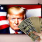 Trump’s $12 Billion BOMBSHELL Shocks Democrats Hand holding cash in front of American flag background with Donald Trumps face