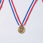 Three medals representing first, second, and third place