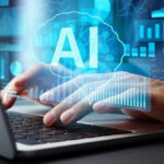 AI Panic Hits Jobs — What’s Real? Person typing on laptop with AI hologram