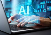 AI Panic Hits Jobs — What’s Real? Person typing on laptop with AI hologram