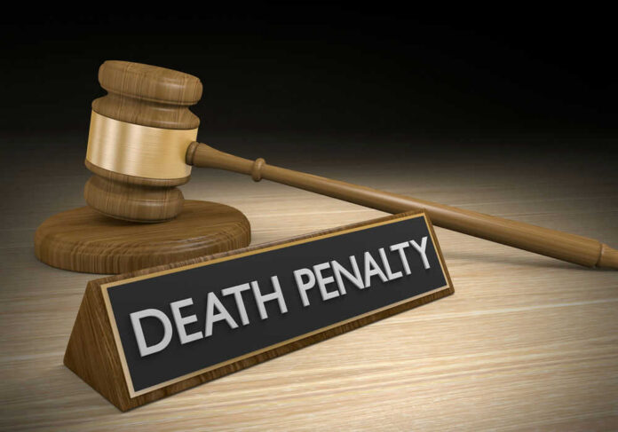 shutterstock_334148753.jpg Gavel beside death penalty sign on desk
