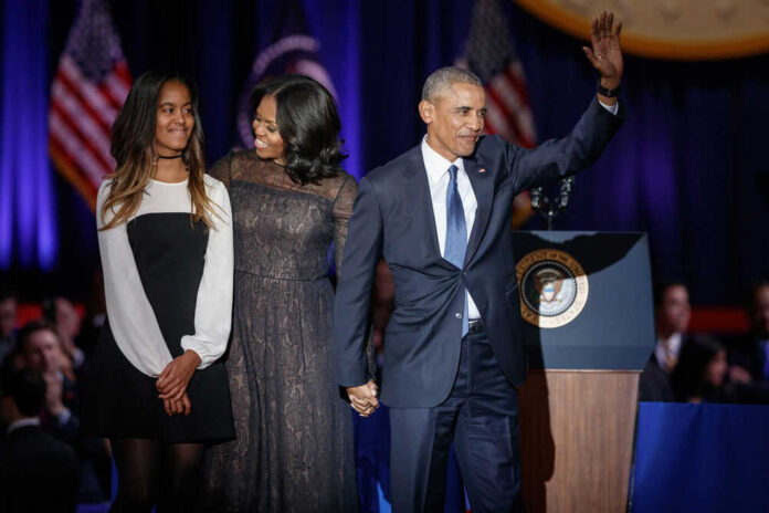 Malia, Michelle and Barack Obama