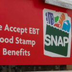 MAHA Agenda Aims at SNAP Recipients Red sign showing SNAP EBT food stamp benefits