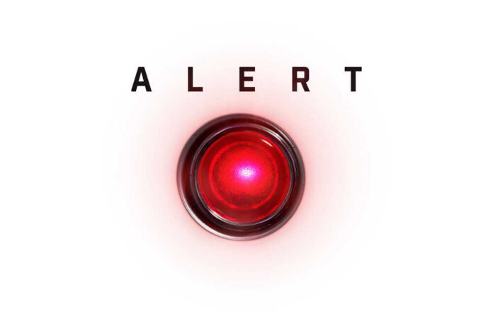 shutterstock_2007583127.jpg A red alert button with the word 'ALERT' above it