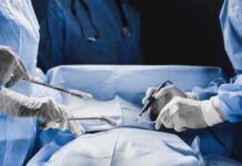 Donor Status Vanishes — Families Blindsided at Death Surgeons performing a procedure in an operating room