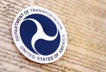 Department of Transportation logo on a historical document background