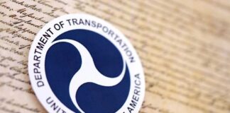 Department of Transportation logo on a historical document background