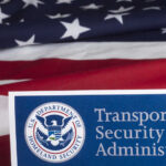 Dems Trigger TSA Nightmare at Airports Transportation Security Administration sign in front of an American flag