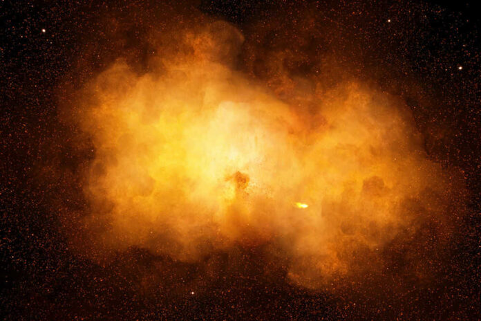 Bright orange cosmic explosion in space with stars around.