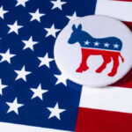 Map Grab: Democrats BLINDSIDED Democratic donkey button on American flag background.