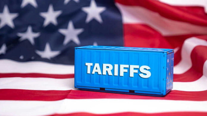 shutterstock_2593025849.jpg Shipping container reading tariffs on the American flag
