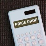 Trump SLASHES Drug Prices — Pharma Finally Loses Calculator displaying the message 'PRICE DROP'
