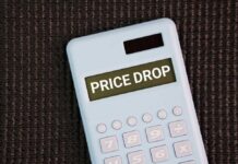 Calculator displaying the message 'PRICE DROP'
