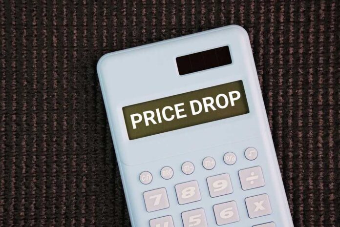 Calculator displaying the message 'PRICE DROP'