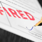 NOW: Navy Chief FIRED! Fountain pen signing document with the word fired