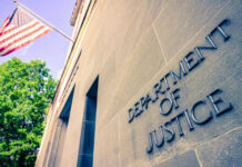 DOJ Seeks Death For These Two Murders Department of Justice building with American flag.