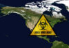 RARE Ebola Strain Triggers Global Alarm! North America map with biohazard warning triangle overlay