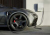 EV Maker’s SHOCKING Loss – 70-Year Streak Broken! Electric car charging at a station.