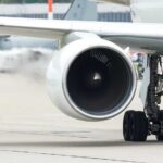 Runway Horror: Trespasser Sucked Into Jet Engine (VIDEO) Close-up view of a jet engine and landing gear on an aircraft at an airport
