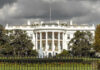 White House Shootout: Suspect Dead; Bystander Wounded The White House with dark clouds overhead.