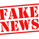 Fake news red stamp with textured appearance