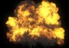 Hypersonic Strike Hits Kyiv A large explosion with flames and smoke against a dark background