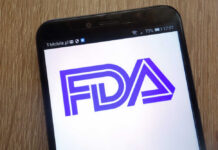 FDA Bombshell — Sunscreen Rules Upended Close-up of a smartphone displaying the FDA logo