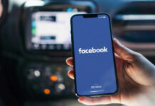 Surprise Cash Hits Facebook Veterans Phone displaying Facebook app in a car