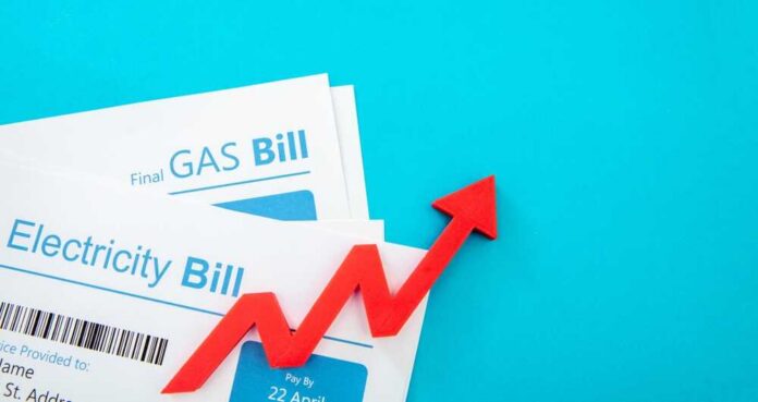 Utilities,Accounts,And,Red,Rising,Up,Arrow.,Electricity,And,Gas Electricity and gas bills with a red upward arrow