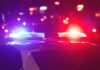VIDEO: Jet Crash, Rescuers Defy the Flames Police car with flashing red and blue lights at night