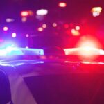VIDEO: Jet Crash, Rescuers Defy the Flames Police car with flashing red and blue lights at night