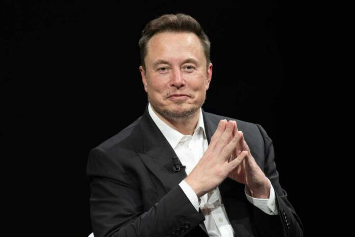 shutterstock_2318800323 Elon Musk in a suit talking.
