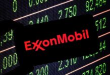 Oil pumps and financial charts against world map