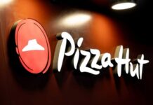 Icon Dumped: Pizza Hut Axed Illuminated Pizza Hut sign on a dark background