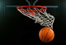 Basketball swishing through a hoop