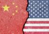 NOW: China Pipeline to U.S. Border Revealed? Cracked surface revealing the flags of China and the USA